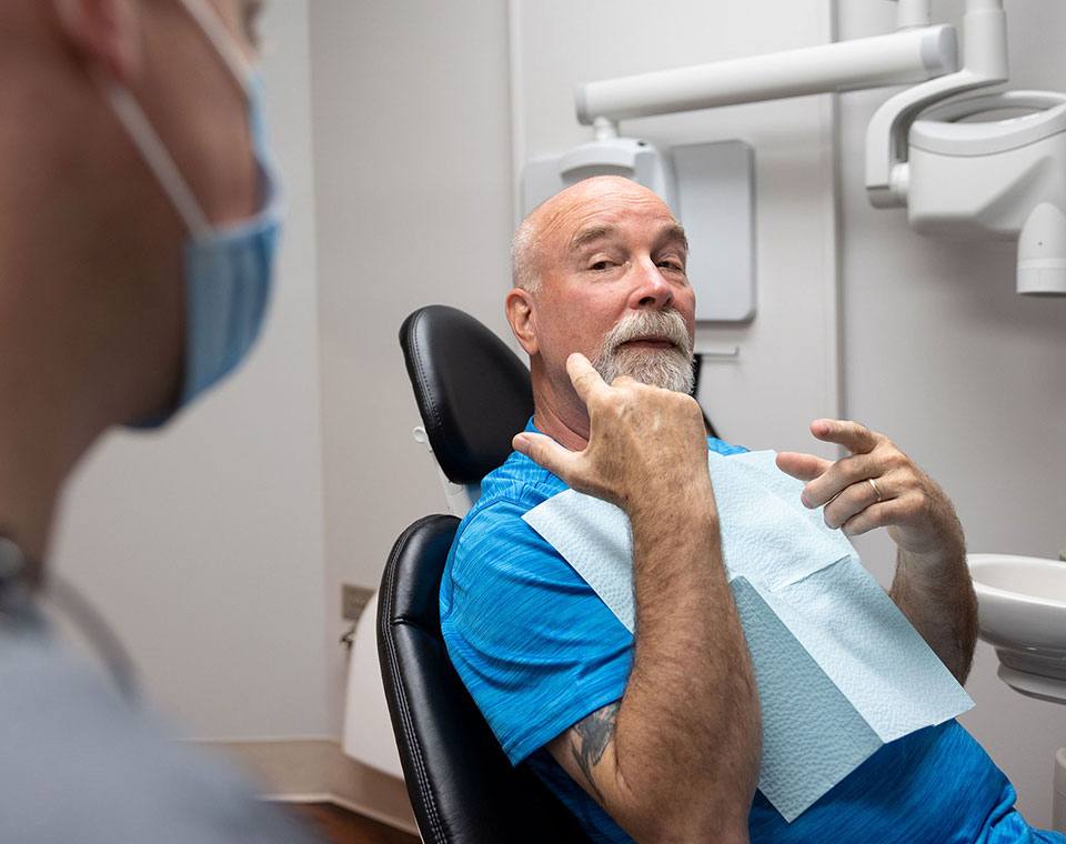 Woman smiling during dental office visit