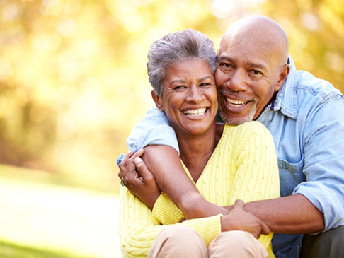 couple smiling with All-on-4 implants in Ledgewood, NJ