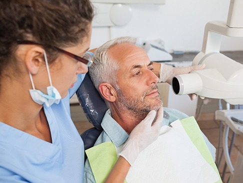 mature man getting dental X-rays  