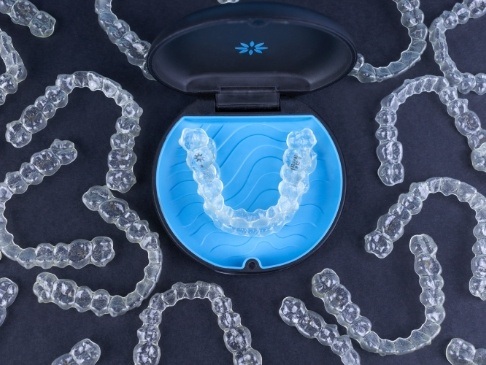 Invisalign clear braces trays and carrying case