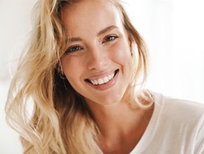 Closeup of woman with blonde hair smiling