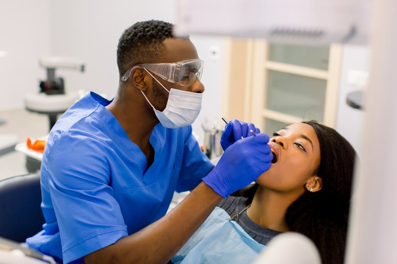 dentist treating their patient